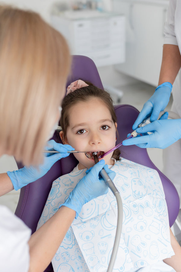 Child to the dentist. Child in the dental chair.